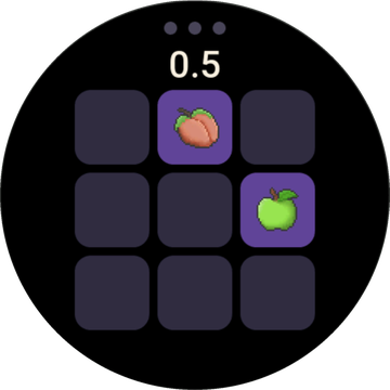 A run half a second in: a three-by-three board on black, a peach and an apple lit on their tiles.